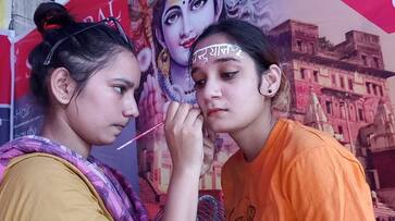 Youth made moon mission tattoo on head and face in varanasi uttar pradesh