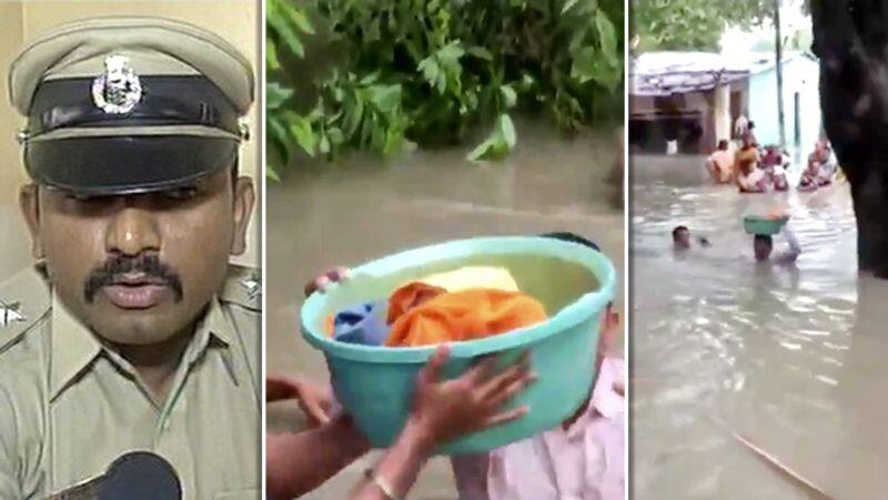 Police officer who saved the baby with a single hand in neck level water..