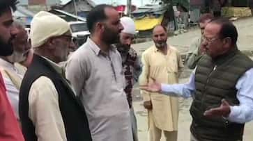 national security adviser ajit doval seen in shopian jammu kashmir with villagers