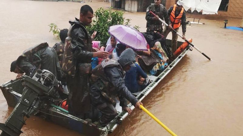 Karnataka floods Death toll rises 24 Government pegs loss at Rs 6000 crore