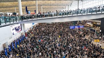 Hong Kong's airport shut down after thousands intensify protest