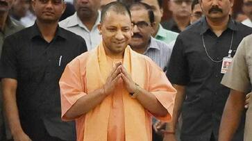 Saffron color sheet laid in hospital before Yogi's visit