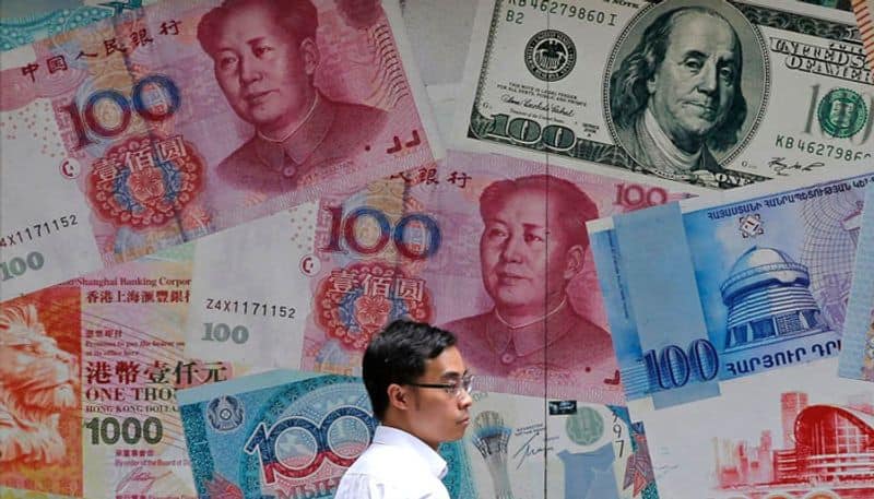 yuan face serious damage in its exchange rate with us dollar