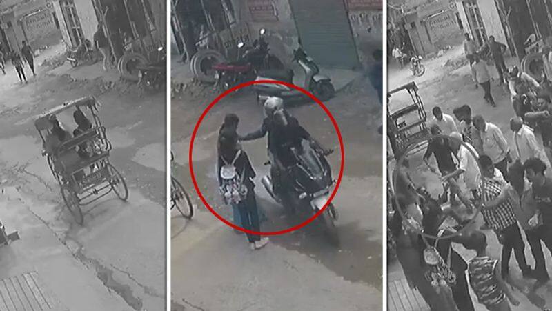 chain snatchers caught red handed by a woman and public in Nangloi, Delhi.. CCTV Video..