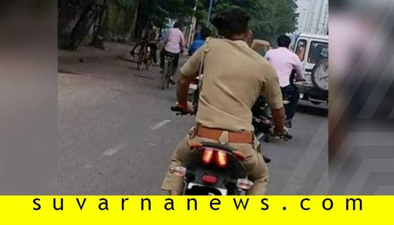 Traffic cop stopped for riding a two wheeler without helmet fined Rs 34000