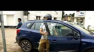 A car driver punished because not wearing helmet in aligarh uttar pradesh