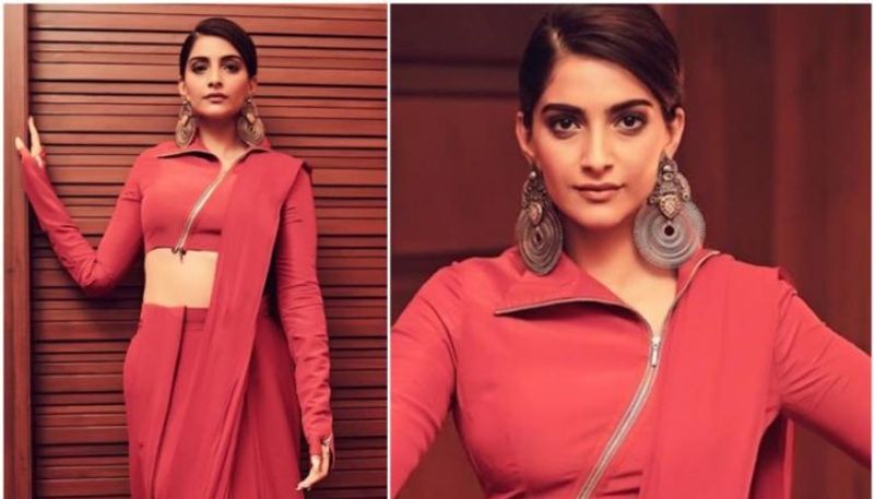 Sonam Kapoor gives a modern look to a classic saree