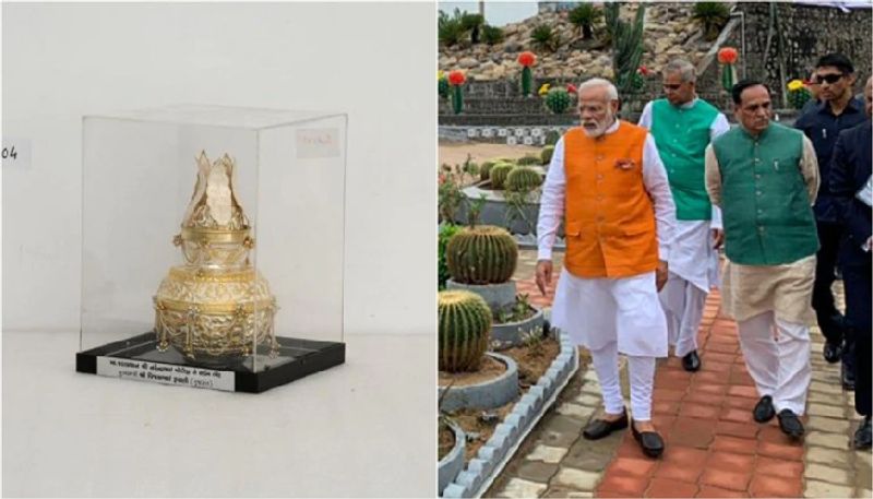 PM Modi photo stand silver kalash auctioned for Rs 1 crore each