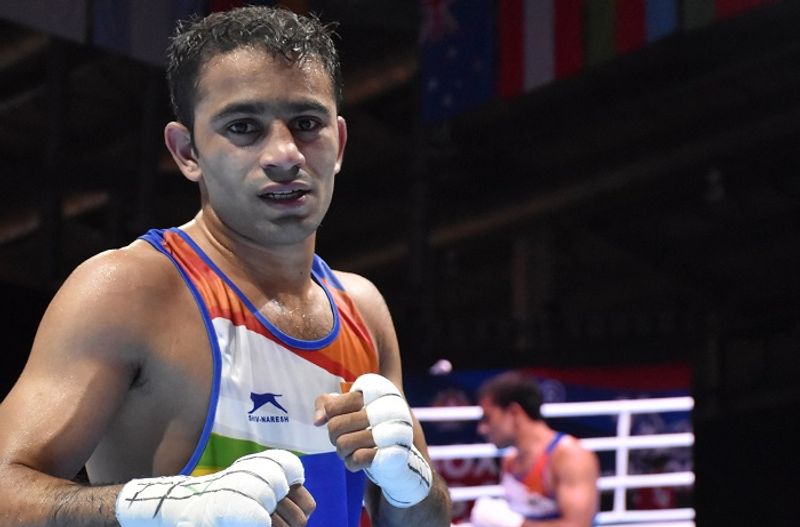 Amit panghal become first Indian to reach World boxing championship final