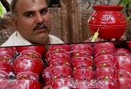 Navratri 2019: Artist decorates garba pots with 'Article 370' message