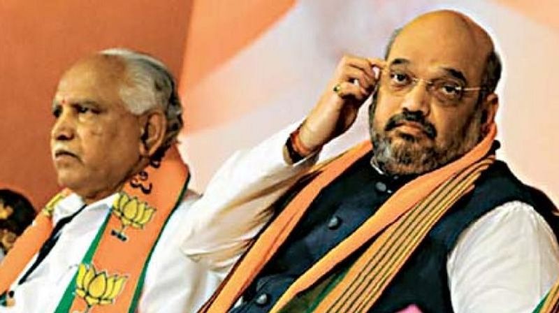 cm bs yediyurappa not daring to look into Amit Shah eyes