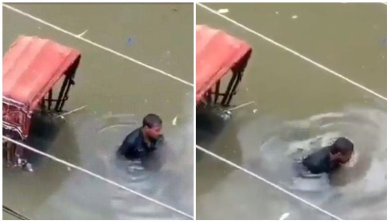 video of rickshaw driver crying after his livelihood lost in flood