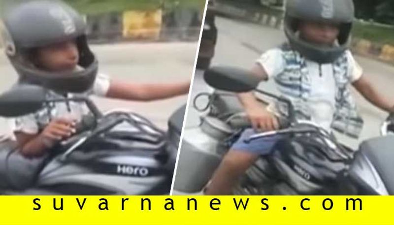 8 year old boy riding bike video viral police fined rs 30000 for his father