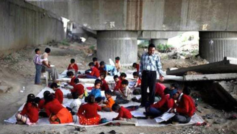 Outdoor Lesson to Children During Flood in Gangavati