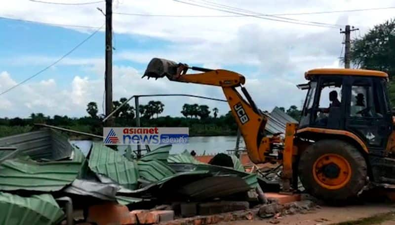 demolition of illegal constructions on Krishna river banks