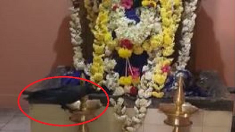 Crow enters to Shani temple in maddur sits near idol