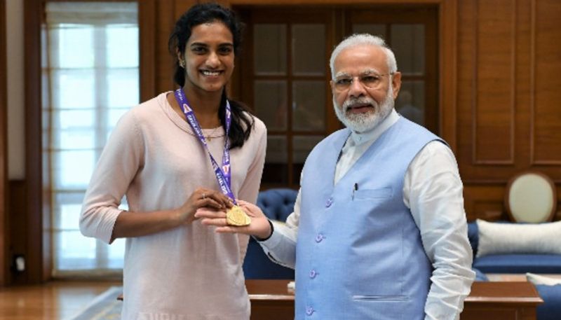 PV sindhu definitely go and have ice cream with the PM Modi says father PV Ramana ckm