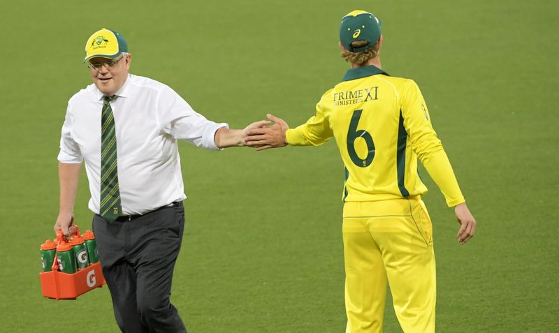 Australia prime minister Scott Morrison turns water boy in warm up game