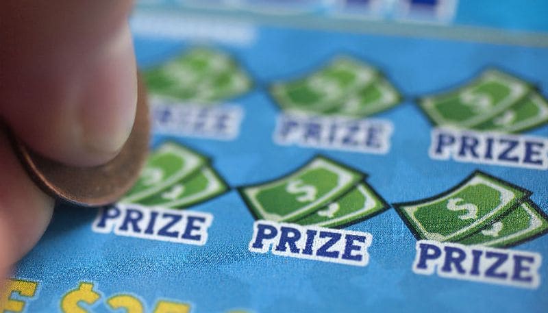 man wins 2 million after accidentally buying an extra lottery ticket