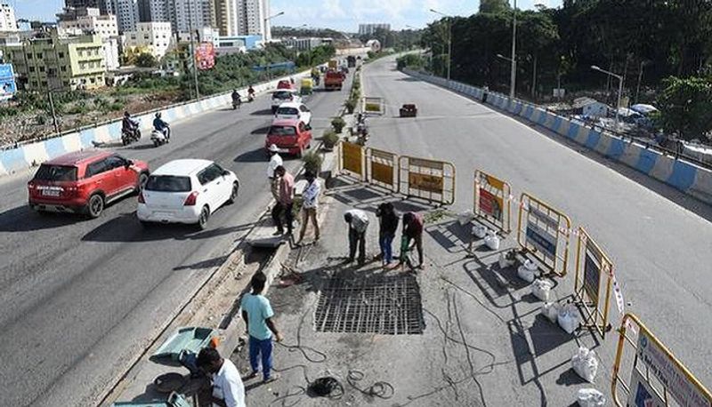 pothole in sumanahalli flyover route bund