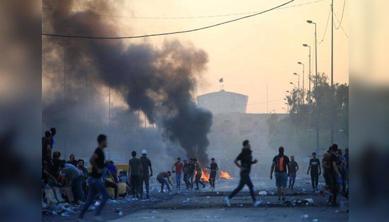 Iraqi troops kill protesters in Baghdad and Basra; turmoil heightens