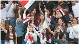 protesters in iraq celebrate football win against iran