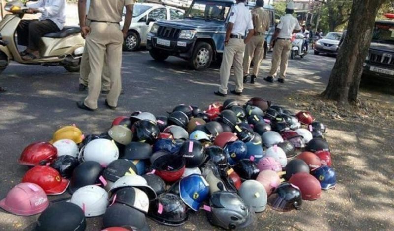 police strictly warns bike riders not to wear half helmets