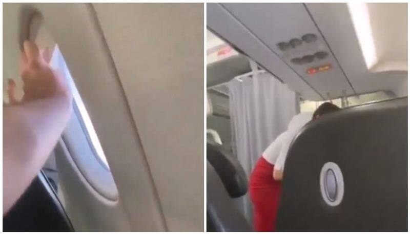 two passengers in flight fight over window seat