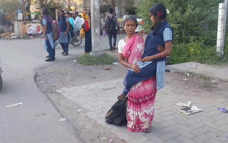 mother carries physically challenged daughter to school daily