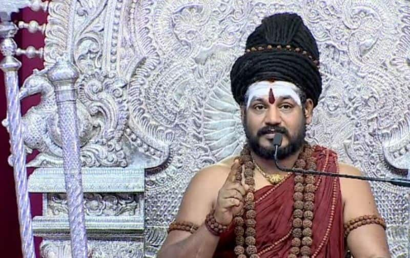 Acid pouring and destroying ... screaming Nithyananda