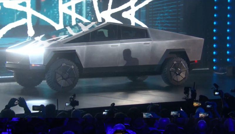 Teslas electric pickup truck claimed bullet proof break window glass during launch