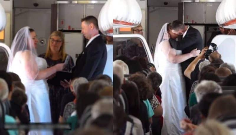 Couple gets married at 34000 feet in flight