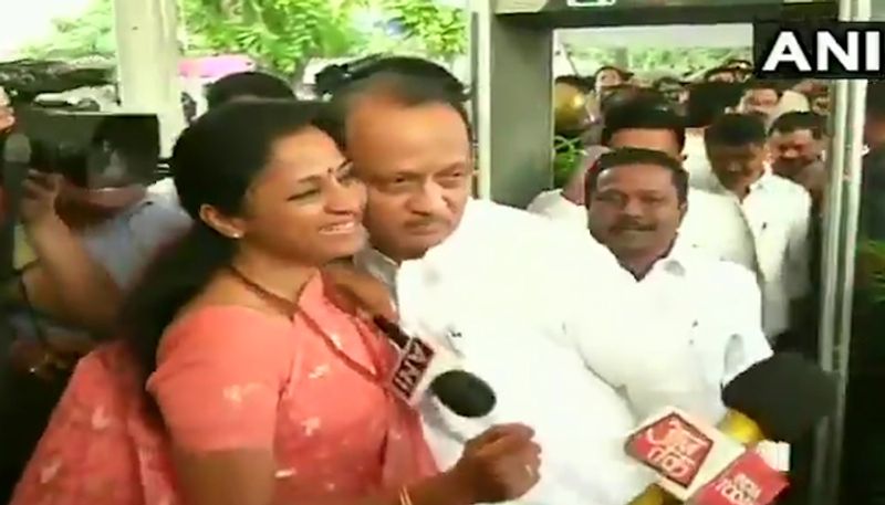 Sharad Pawar daughter Supriya Sule greets cousin Ajit Pawar with a hug before Maharashtra Assembly session