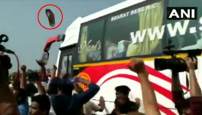 A slipper was hurled at the bus carrying  former chief minister N Chandrababu Naidu