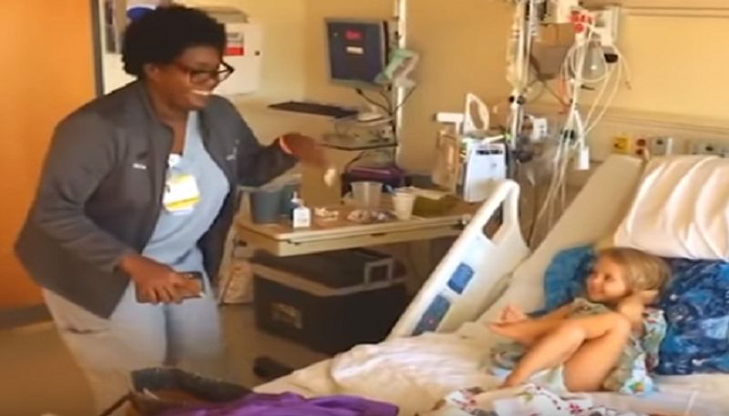 Nurse dances to cheer up toddler recovering from cancer