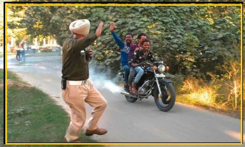 triple riders escape from checking Chandigarh police issued 15k e challan