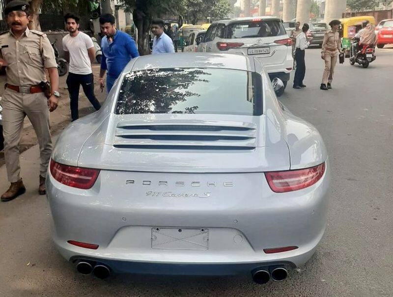 Ahmadabad police slapped of Rs. 9 Lakh 80 Thousand fine to Porsche 911 car for traffic violation