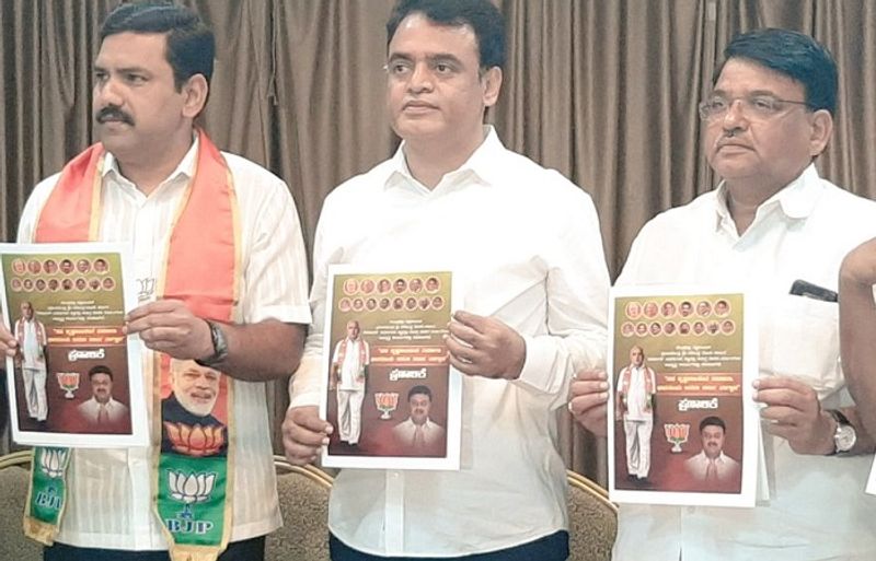 bjp manifesto released in kr pet by dcm ashwath narayan