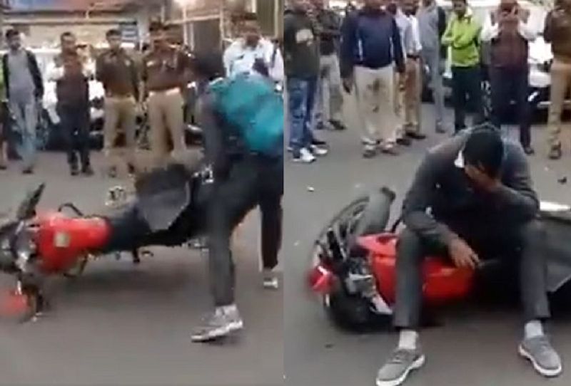 Rider destroy bike after police fined without helmet in meerut