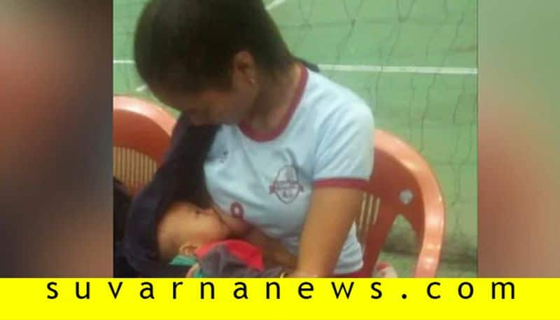 Mizoram Volleyball Player Breastfeeds Baby In Break this cute picture goes Viral