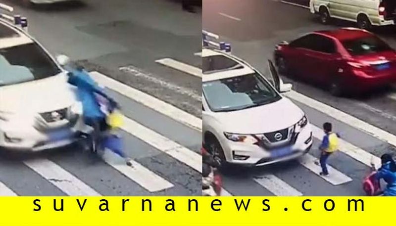 Angry Little Chinese Kid Kick Car That Knocked Down His Mother On Zebra Crossing