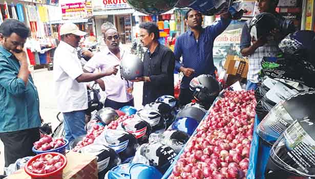 1 kg onion free for 1 helmet