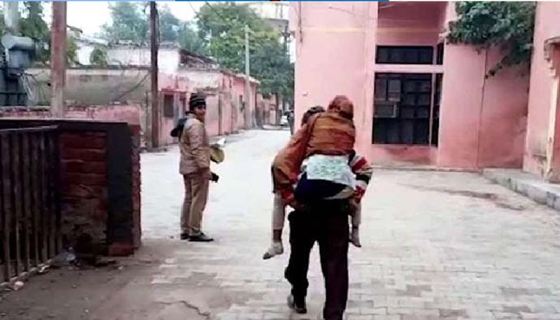 Man carried his daughter who was raped on his back to the hospital for medical examination.