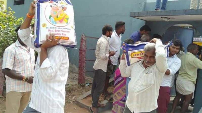 local body election... aiadmk candidates 25 kg rice packets distributed