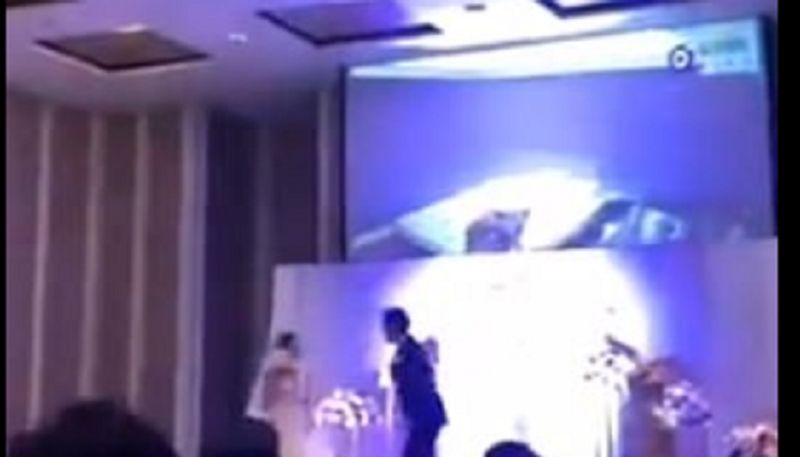 Groom takes revenge on his cheating bride by playing a video of her naked in bed China