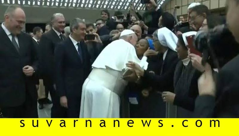 Don not bite Pope Francis negotiates papal kiss after controversy