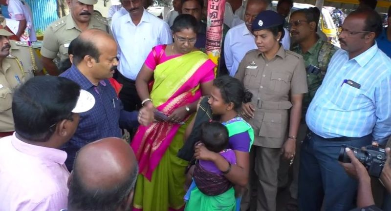 district collector questioned a woman who begged with a child