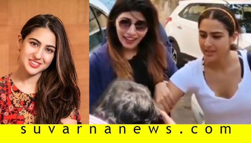 Bollywood Sara ali khan steps out of gym fans tries to kiss her hand