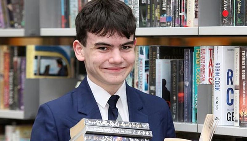 14 year old boy can identify books by their opening sentence