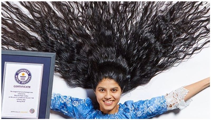 teen girl to Guinness world record with  longest hair